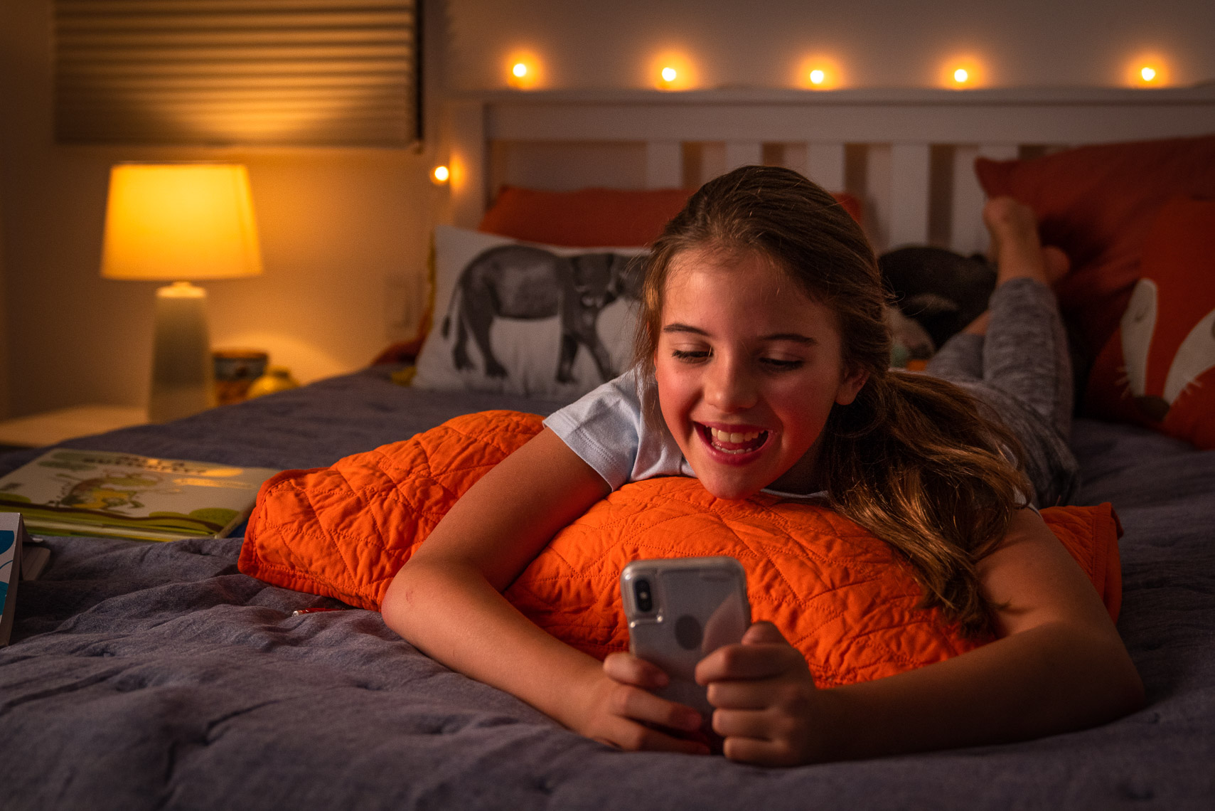 Avast - Tween on Smart Phone in Bed Room