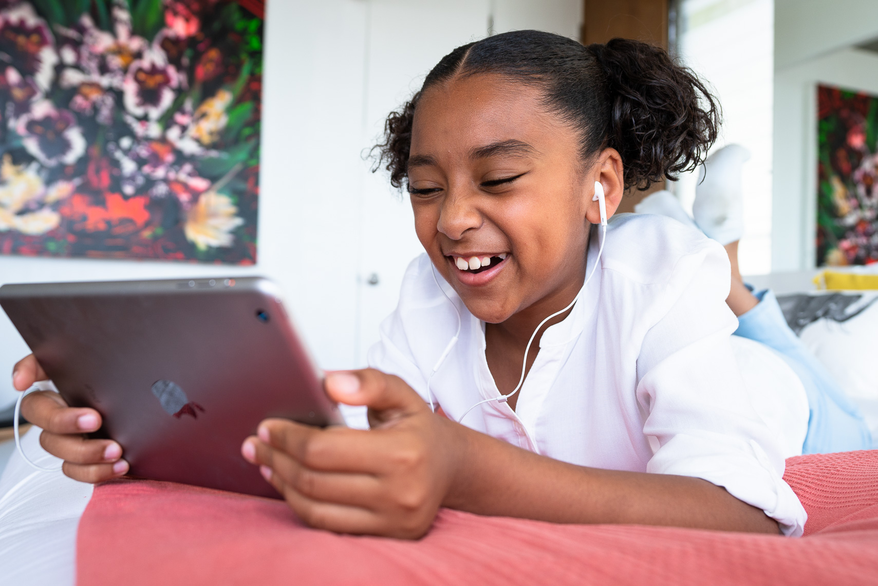 Avast - Young Girl In Bedroom Watching iPad