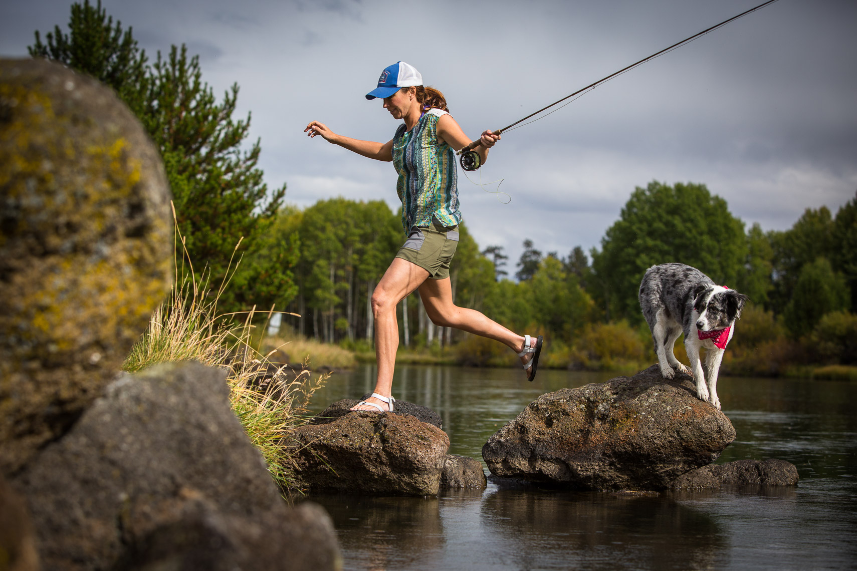 Woman Flyfishing on the Deschutes River with Dog