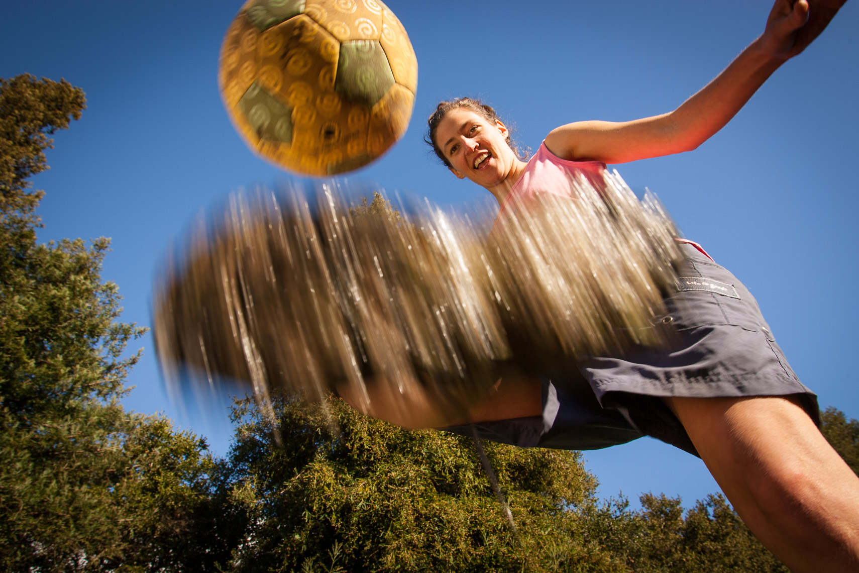 Woman Juggling a Soccer Ball