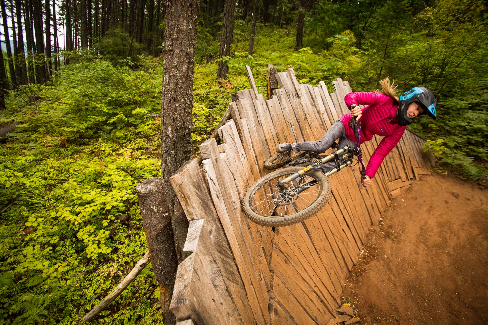 Woman on Mountain Bike Feature Post Canyon Hood River Oregon