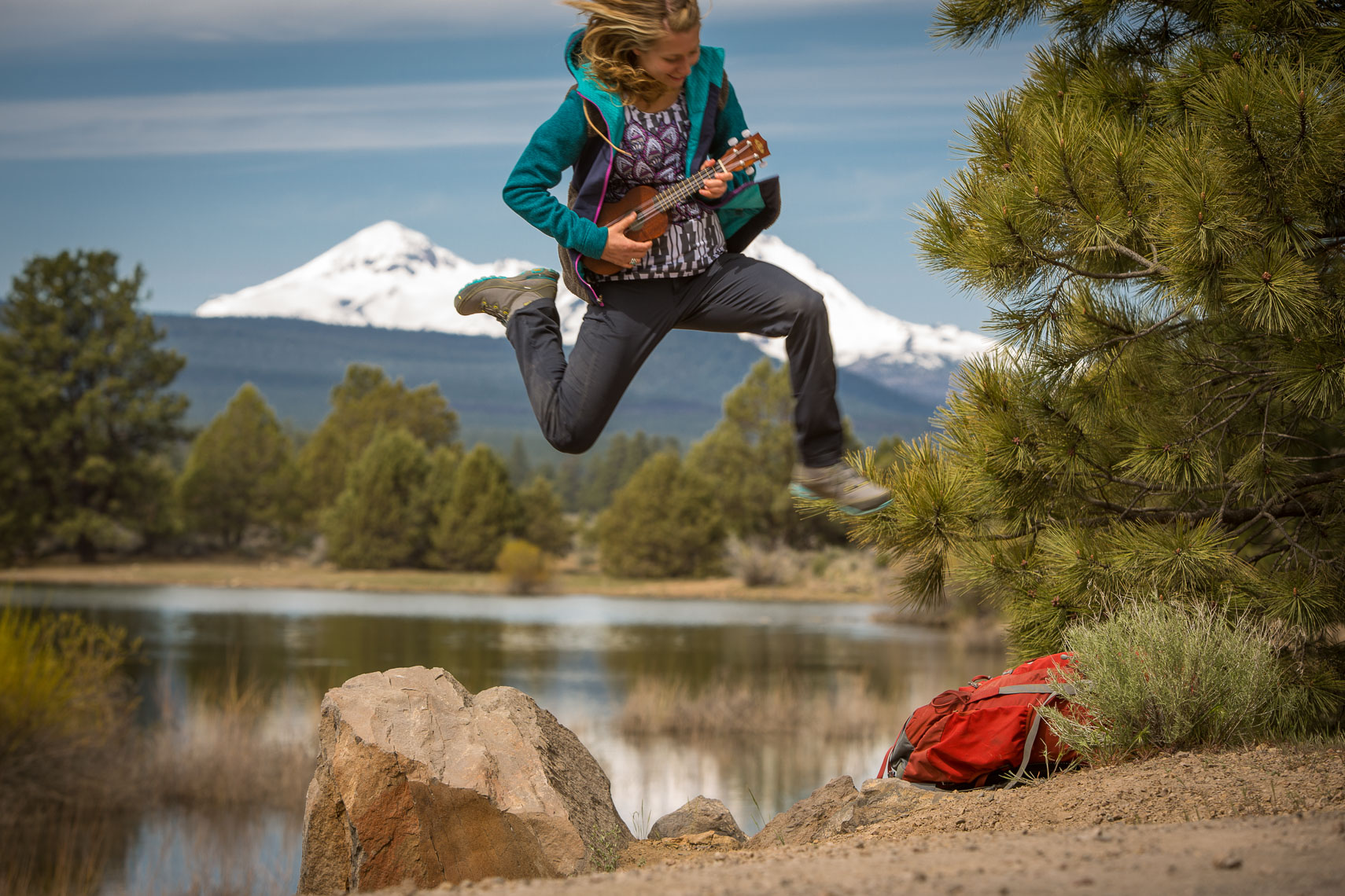 Woman Playing Ukulele in Mountains 